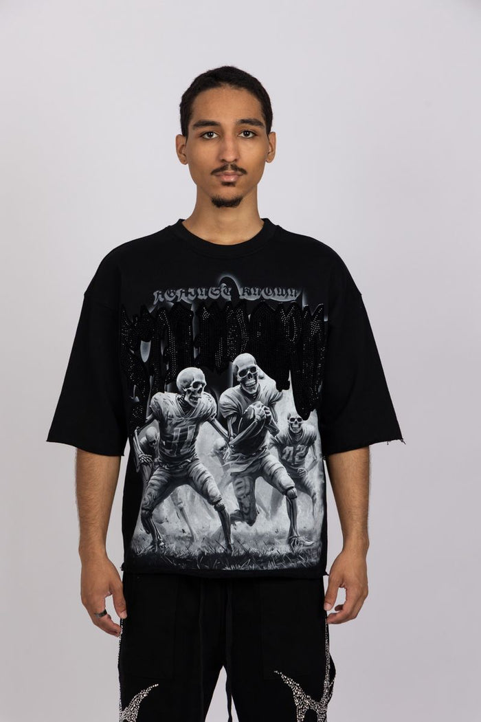 Black AKS 'Blitz' French Terry Boxy Tee, a casual T-shirt with a relaxed fit and soft fabric, shown on a model.