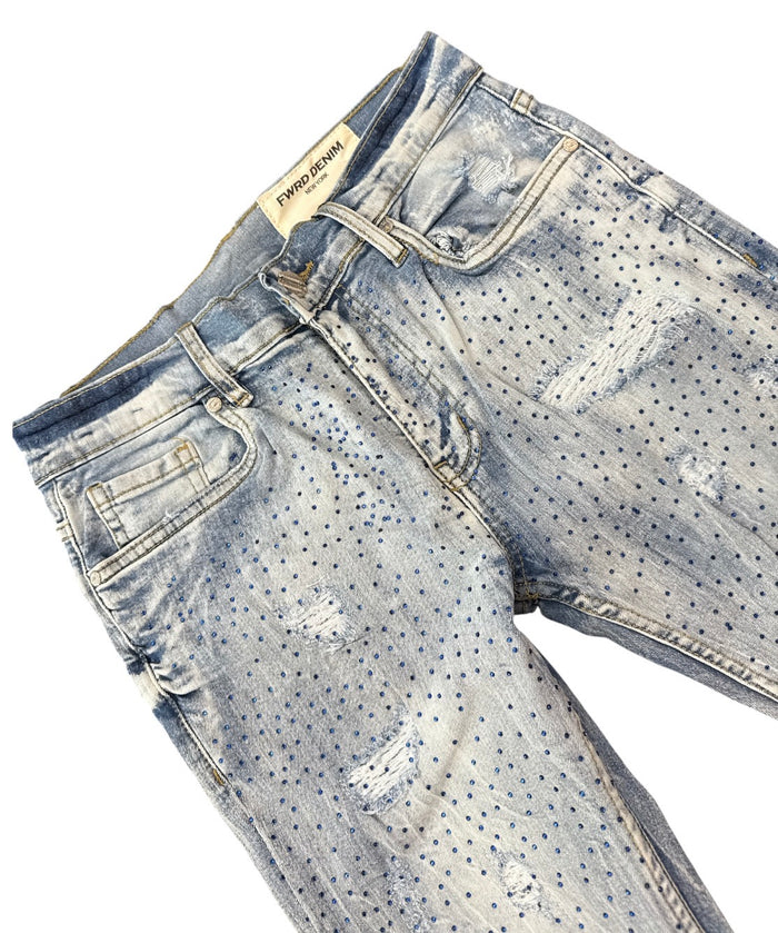 FWRD Crystalized Ice Blue and Royal denim jeans showing fitted design and distinctive crystal embellishments.