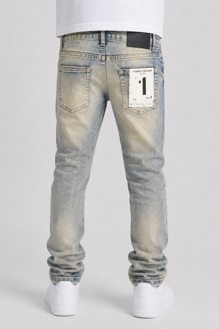 FWRD Kids Crystalized denim jeans in light tint with gold accents, featuring a slim fit and classic five-pocket design.