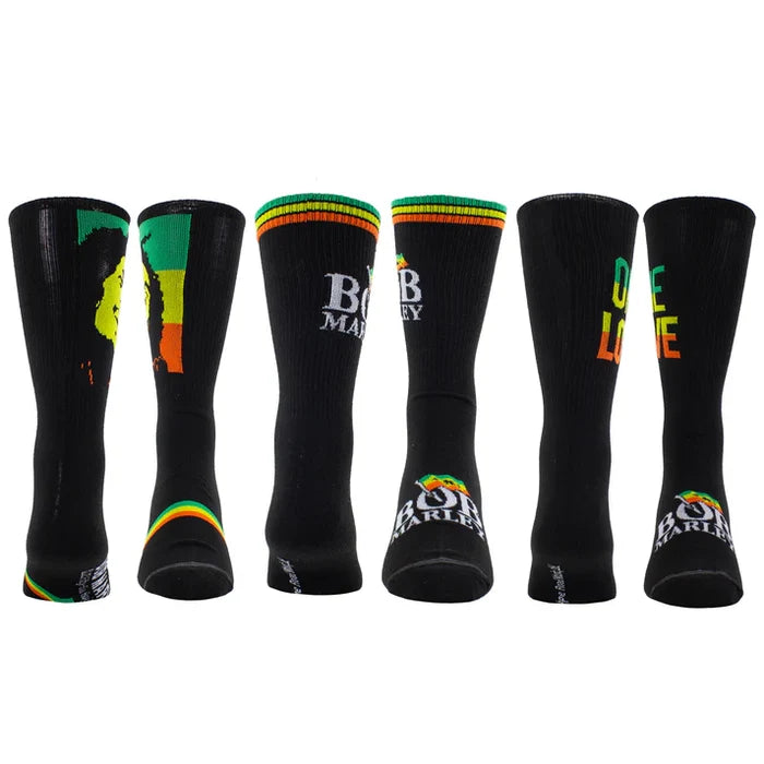 Perri's Bob Marley guitar-themed sock tin box with three pairs of colorful socks featuring musical and reggae patterns.
