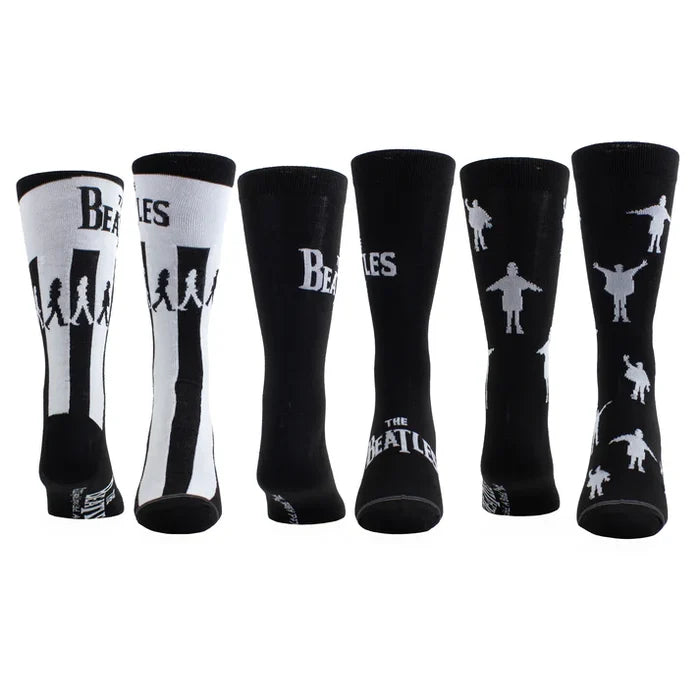 Perri's The Beatles guitar-themed sock box with three pairs of colorful socks displayed in a tin box.