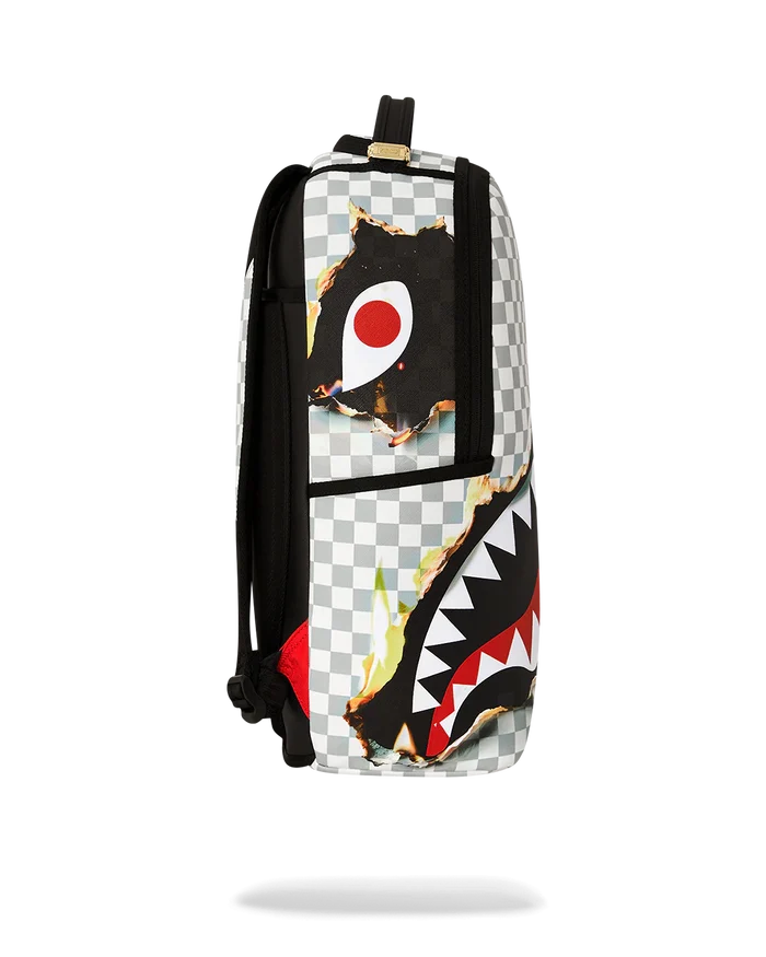 Sprayground Reveal The Real backpack featuring bold graphics, adjustable straps, and multiple compartments for accessories.