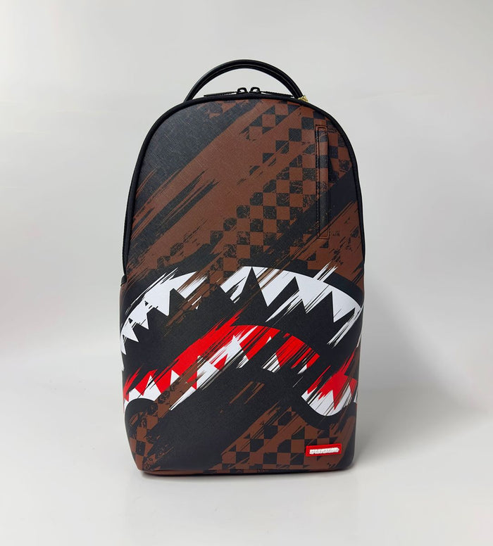 Sprayground Smeared Grunge backpack with black and colorful graffiti design, durable fabric, and adjustable shoulder straps.
