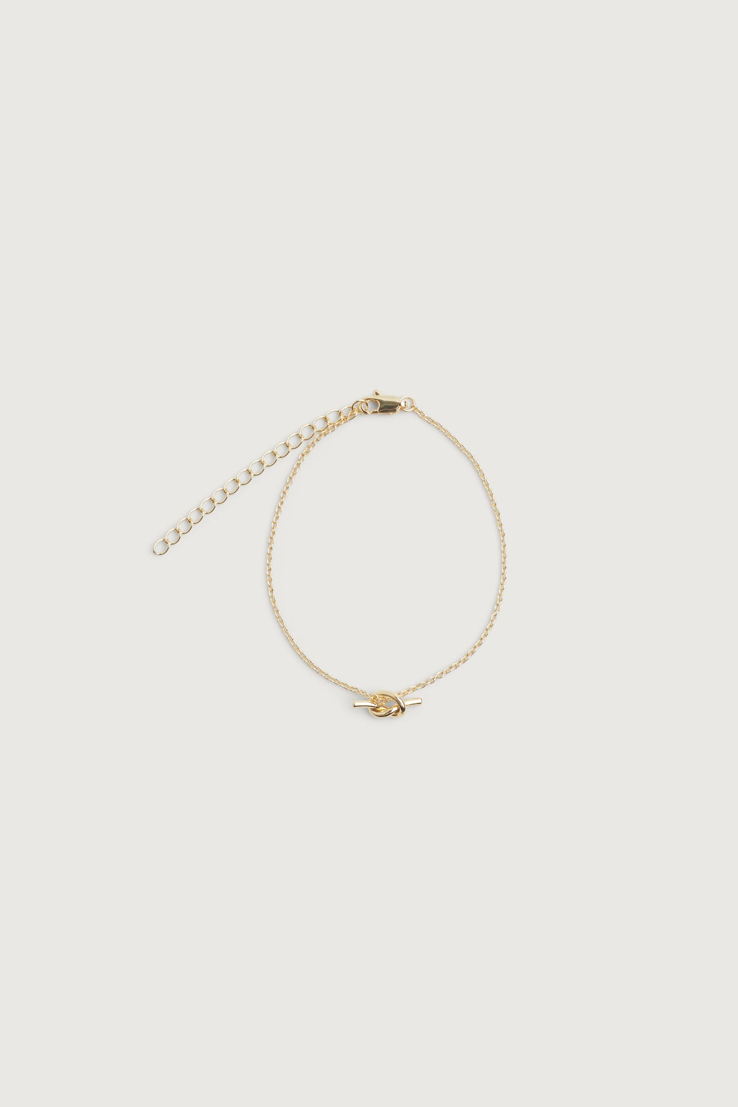 CHAIN BRACELET WITH KNOT CHARM