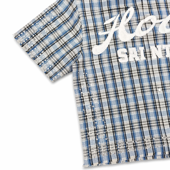 Copper Rivet Fray Holy Saint short sleeve shirt featuring blue stones and detailed design on the front.