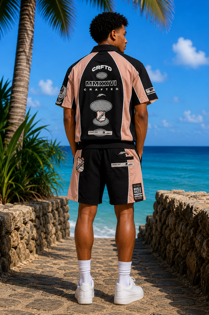 Black Crafted nylon track suit button-up, featuring a sleek design and front buttons, ideal for athletic or casual wear.
