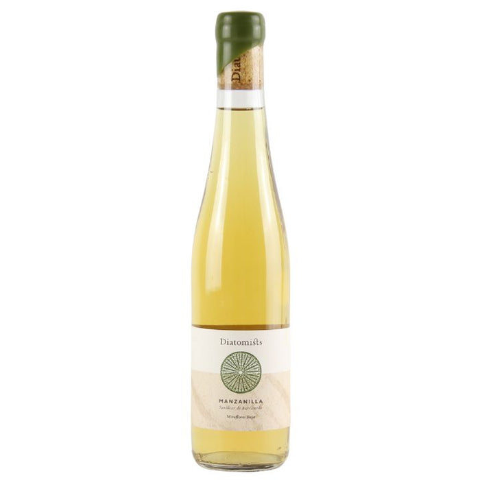 A bottle of Diatomists Manzanilla Sherry with a label that includes the brand name and the word 'Manzanilla'