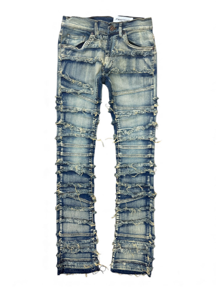 Light tint distressed frayed stacked denim jeans by FWRD, featuring a casual, worn-in look and layered denim design.