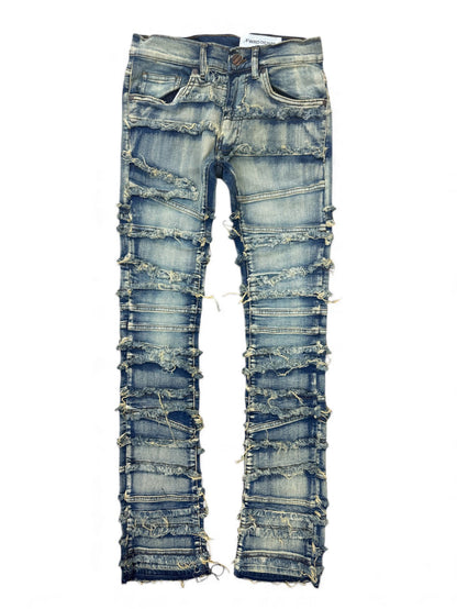 Light tint distressed frayed stacked denim jeans by FWRD, featuring a casual, worn-in look and layered denim design.