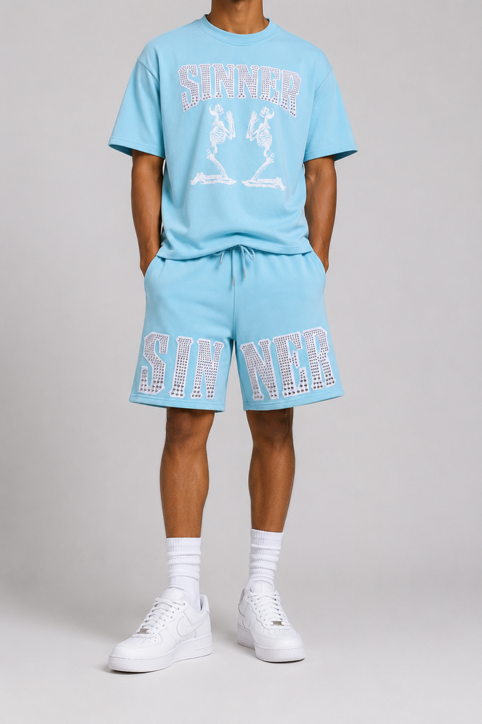 FWRD Skeleton Sinner oversized boxy crop T-shirt in cobalt blue, featuring skeleton graphic design on front.