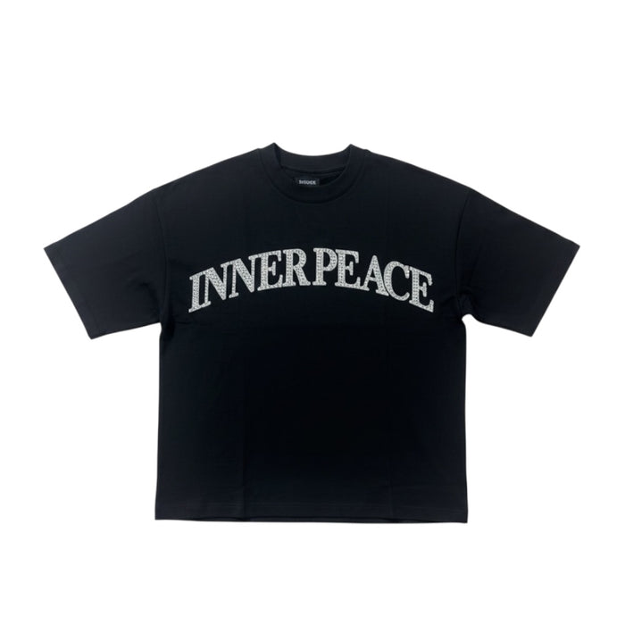Black Inner Peace 'Peace Every Where' oversized rhinestone T-shirt with bold peace symbol design on front.