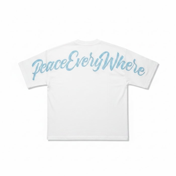 Inner Peace white oversized rhinestone T-shirt with "Peace Everywhere" slogan, casual style, front view, detailed rhinestone embellishments.