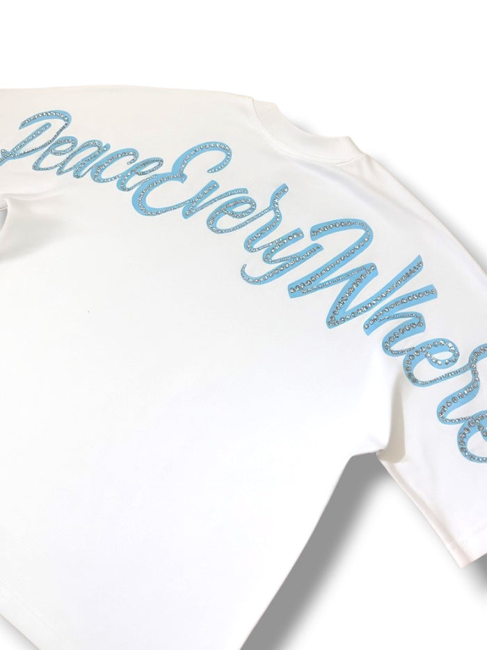 White Inner Peace 'Peace Everywhere' oversized rhinestone T-shirt with bold peace sign graphic and comfortable fit.