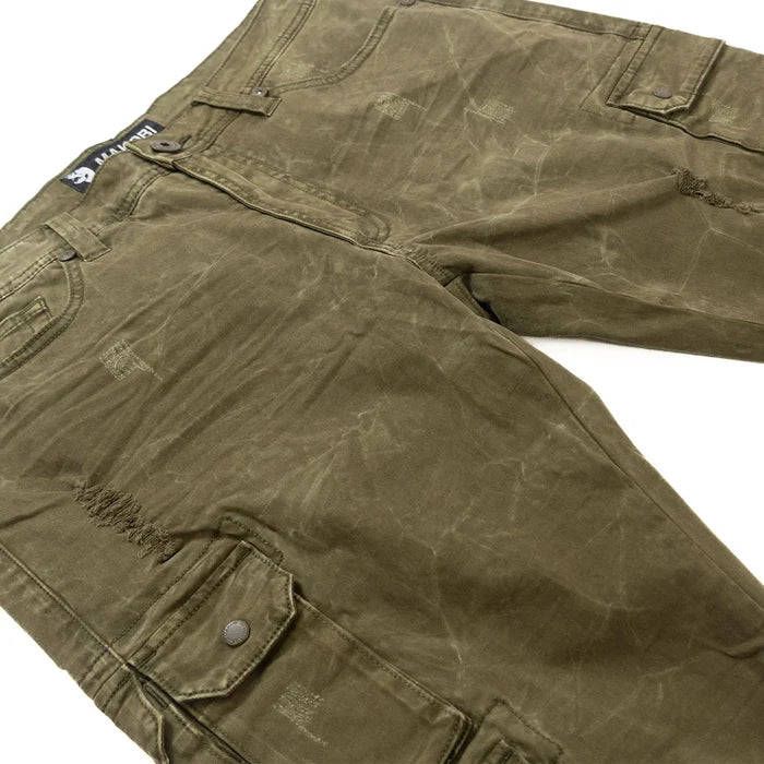 Makobi Berteli cargo pants in olive denim, showing a close-up of the stylish, durable fabric and functional pockets.