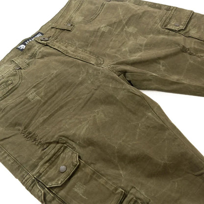 Makobi Berteli cargo pants in olive denim, showing a close-up of the stylish, durable fabric and functional pockets.