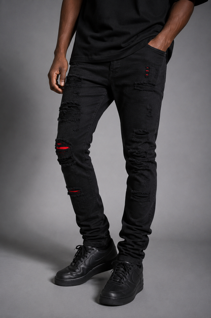Makobi Modena black denim jeans with red stitching, slim fit style, made from durable denim fabric.