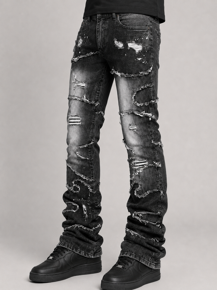 Makobi Pastoni stacked denim jeans in black wash with a relaxed fit and layered design, showcasing the stylish black denim fabric.