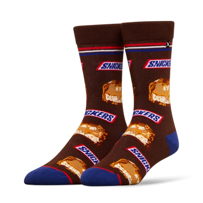 ODD SOX Snickers socks 2-pack featuring colorful, patterned sock designs with Snickers branding visible on the fabric.