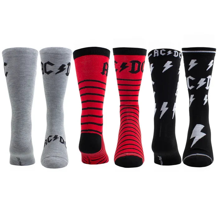 Pair of Perri's AC/DC guitar-themed socks in a tin sock box, featuring rock band logo and musical guitar designs.
