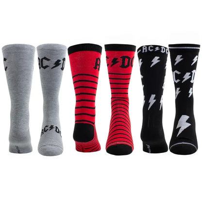 Pair of Perri's AC/DC guitar-themed socks in a tin sock box, featuring rock band logo and musical guitar designs.