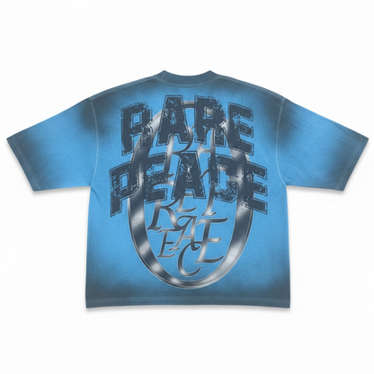 Blue oversized rhinestone T-shirt by Rare Peace with "CHAOS" graphic, featuring a cropped fit and bold, eye-catching design.