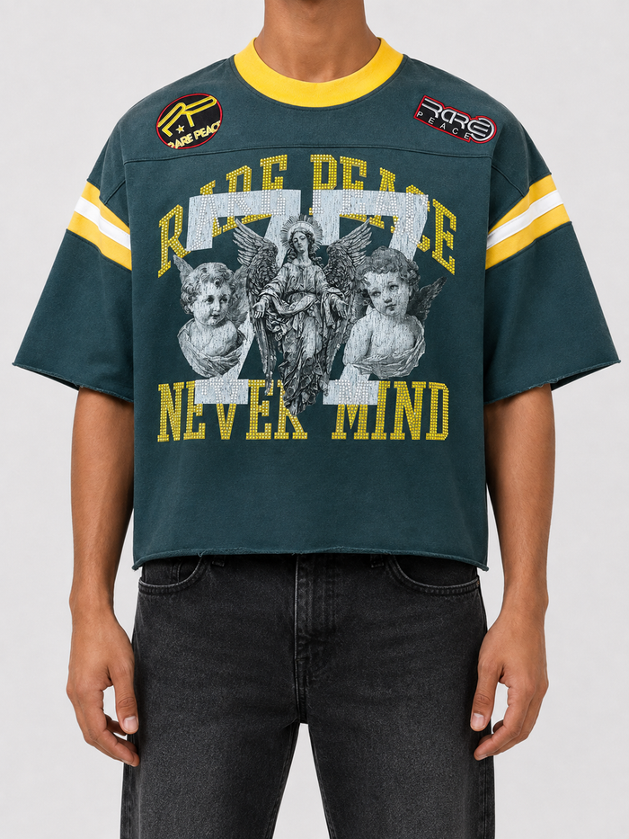 Rare Peace oversized rhinestone cropped French Terry T-shirt in pine green with "Never Mind" design, front view.