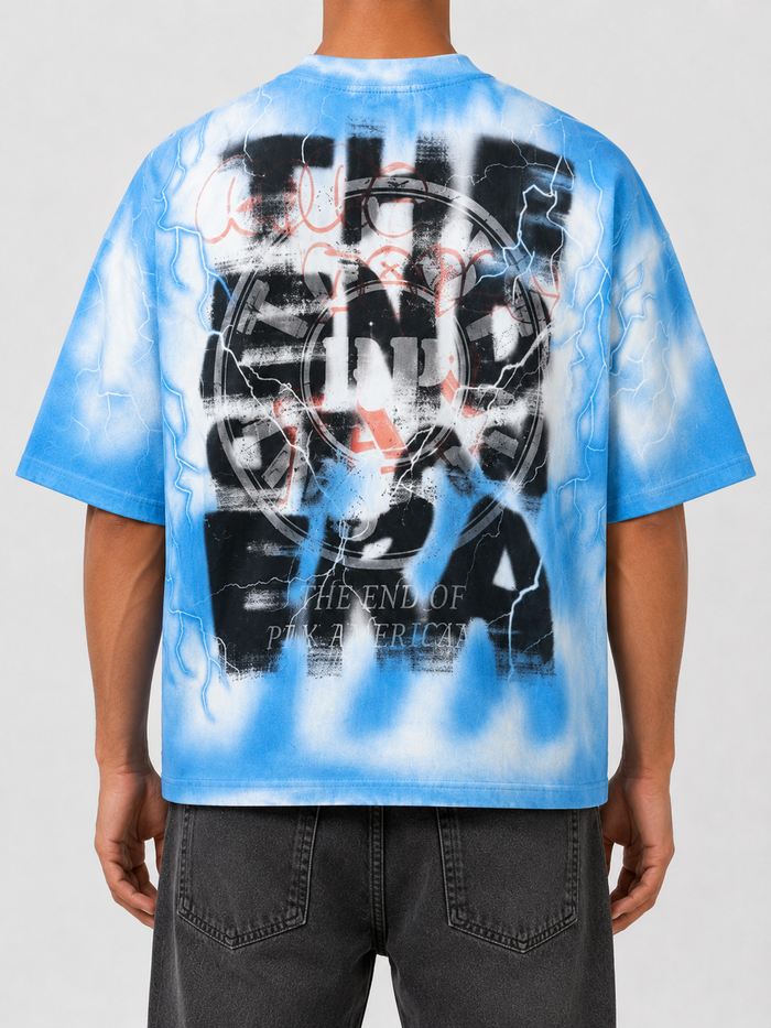 Rare Peace oversized ecru T-shirt with rhinestone "Trust No One" graphic, casual cropped fit, stylish and bold design.