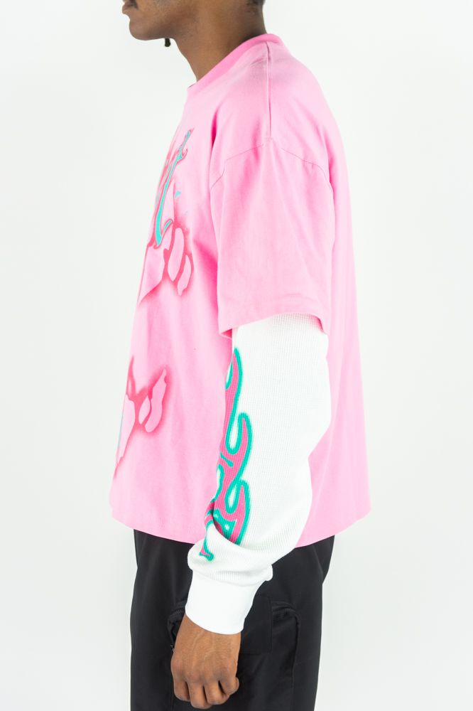 Pink Rebel Minds 'Trust No One' long-sleeve T-shirt with bold black text and logo print on front.