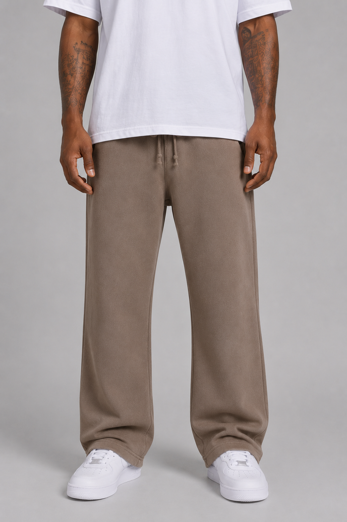 Rebel Minds ultra relaxed taupe sweatpants displayed on a model, featuring a comfortable fit and casual style.