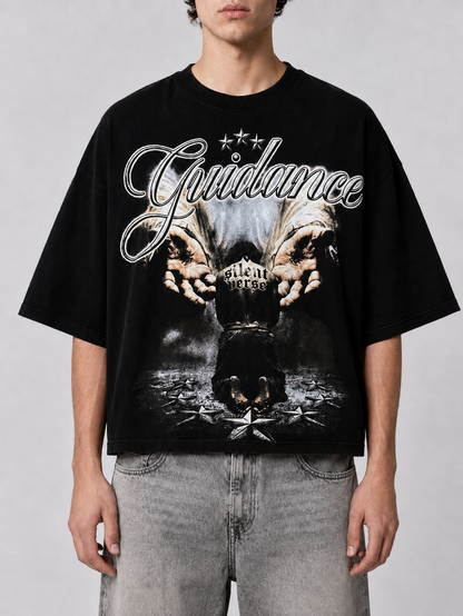 Black Silent Verse Guidance oversized cropped T-shirt displayed on a model, showcasing its relaxed fit and modern style.