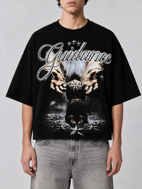 Black Silent Verse Guidance oversized cropped T-shirt displayed on a model, showcasing its relaxed fit and modern style.