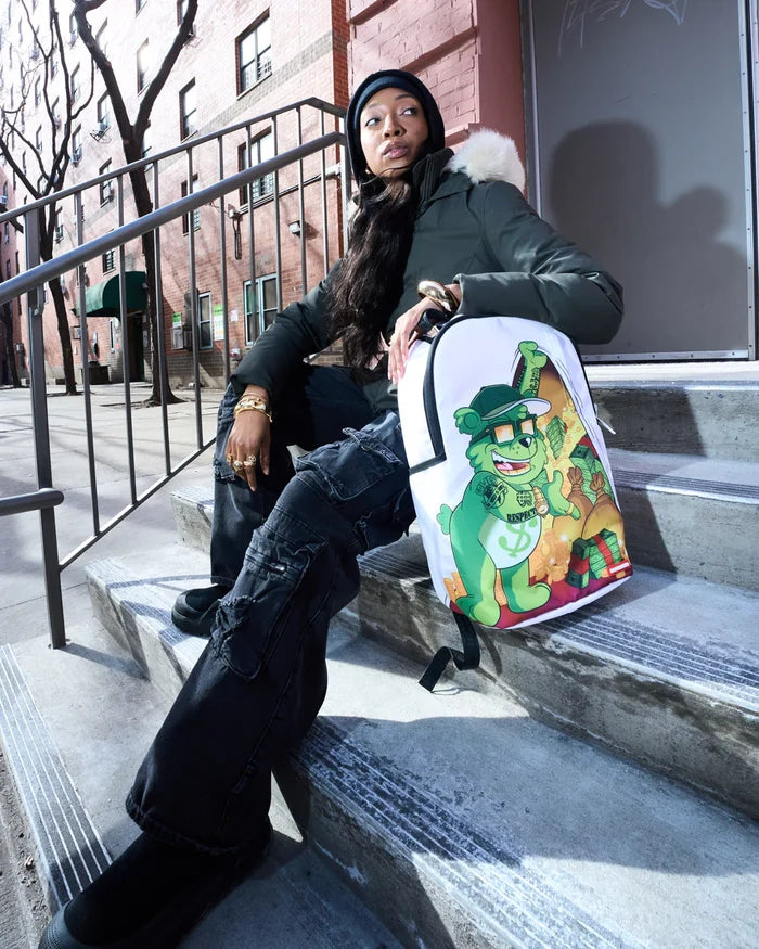 Sprayground Money Bear Stash Backpack with bold design, featuring a bear motif and multiple compartments for accessories.