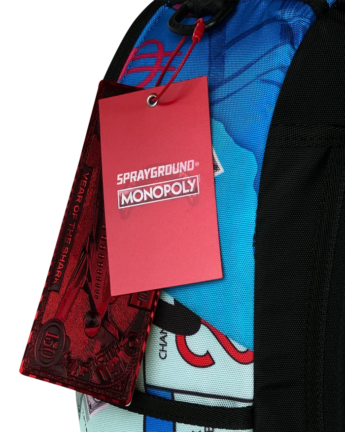 Sprayground Monopoly Grab & Go Go Go backpack featuring bold graphic design and adjustable straps, accessories for stylish carrying.