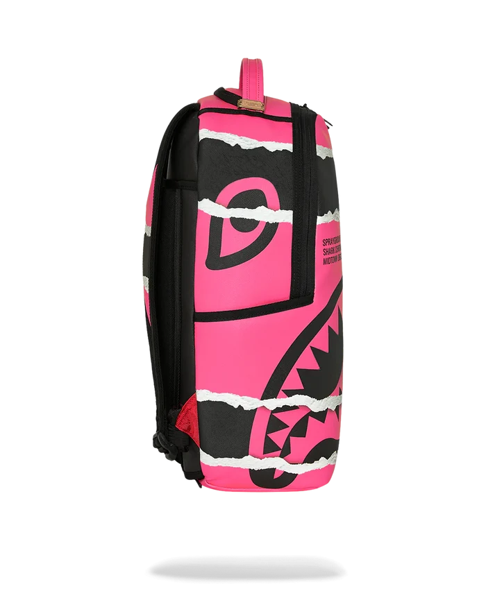 Sprayground Shark Central Split Vision backpack with bold shark graphic, black and white color scheme, and multiple compartments.